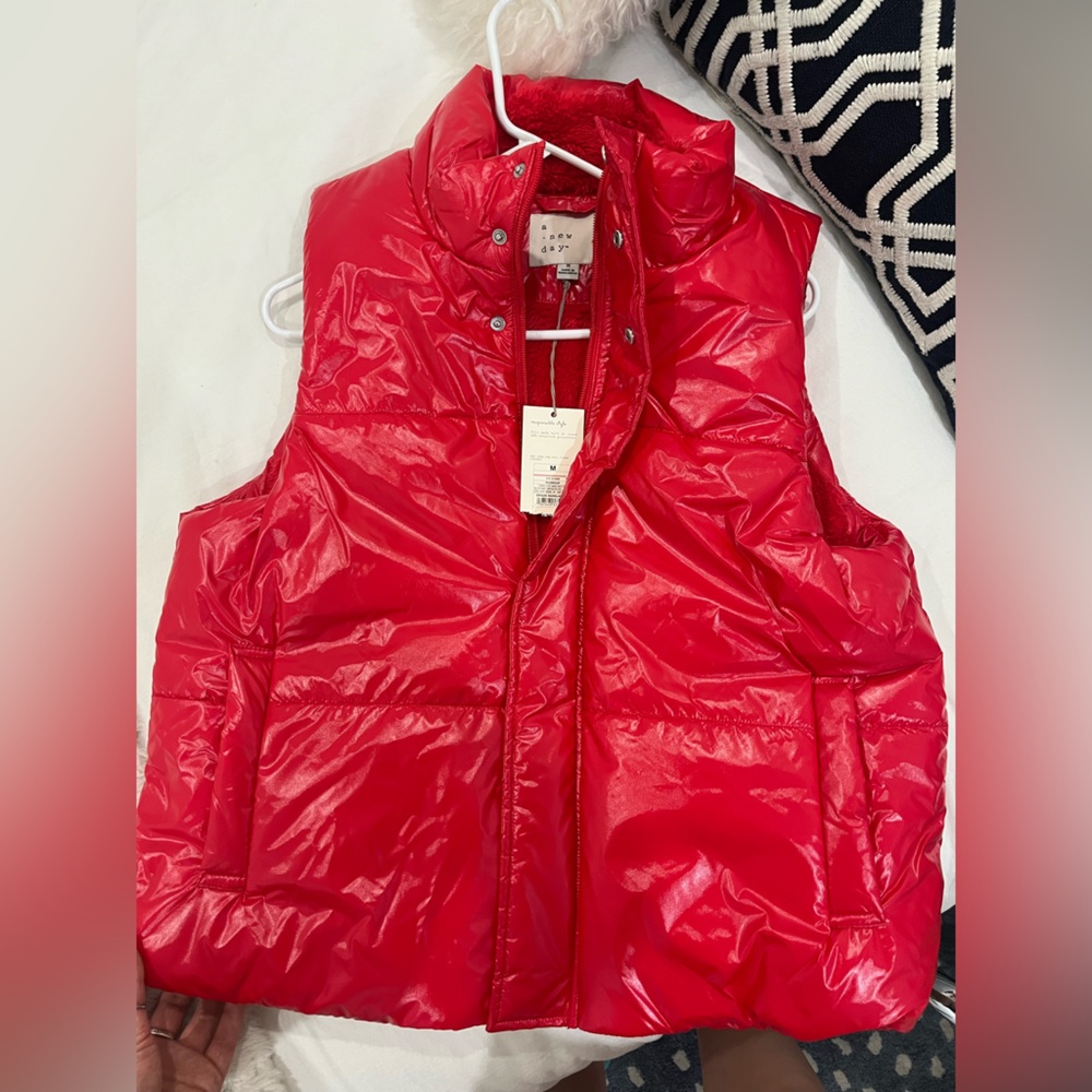 A new day red puffer vest.